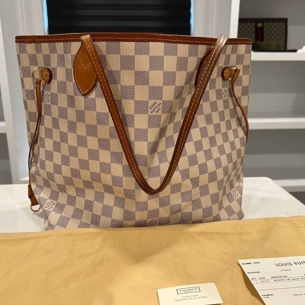 Louis Vuitton never full MM Damier Azur in good condition.